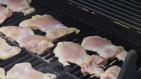 Pan of Raw Chicken on the Grill Video stock 38003978