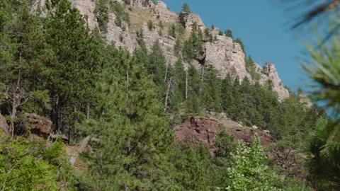 Pan of Red and White Cliffs in South Dakota Gorge Stock Footage 311951461