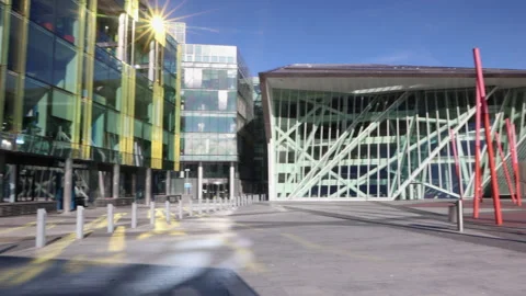 Pan of the redeveloped 'Grand Canal Dock' with Grand Canal Theatre in Dublin Stock Footage 203949744