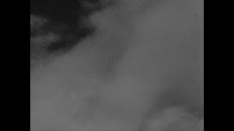 Pan revealing mining tower and surrounding countryside, Sheffield UK 1946 Stock Footage 133387645