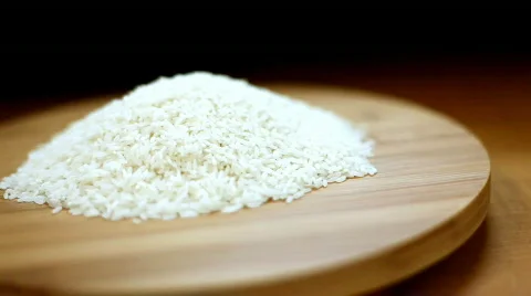 Pan of rice on a cutting board. Stock Footage 311478