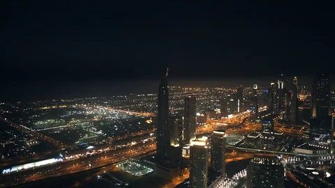 Pan right at 300m, from Sheikh Zayed Road to Burj Khalifa, night. Stock Footage 98978393