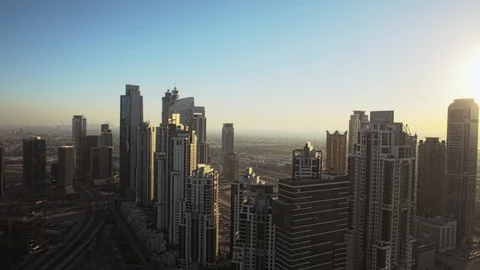 Pan right across Sheikh Zayed Road descending from 150m. Stock Footage 98946026