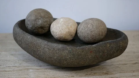 Pan-right: Authentic pre-columbus Caribbean Taino Indian cooking stones. Stock Footage 107891614