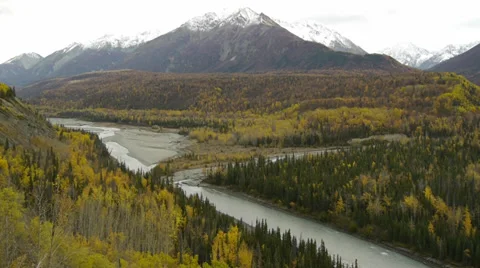 Pan Right, Autumn Forest, Flowing River, Snow-capped Mountains Stock Footage 38112201