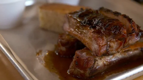 Pan right of BBQ ribs  Stock Footage 112575821