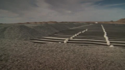 Pan right of blasting mats on an opencast mine Stock Footage 312400465