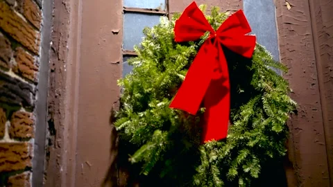 Pan Right Close up Christmas Tree on door Williamsburg Brooklyn NYC 4K Stock Footage 267737612
