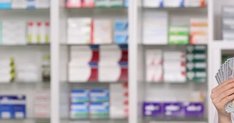 Pan Right Closeup Smiling Medic Woman Looking Camera Show Pills Tablets Dollars Stock Footage 72794777