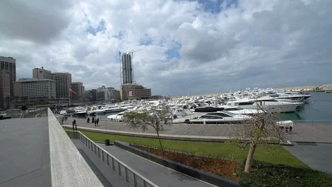 Pan right on coffee shops and Yacht Club at Zaitunay Bay in Beirut, Lebanon Stock Footage 119069655