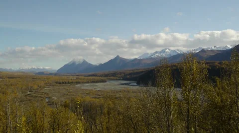 Pan Right, Fall Colors, Trees, Grass, River, Distant Mountains Stock Footage 38086022
