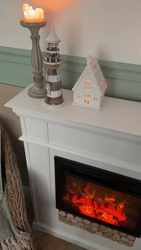 Pan right high angle of electric fireplace in cozy living room Stock Footage 346172470