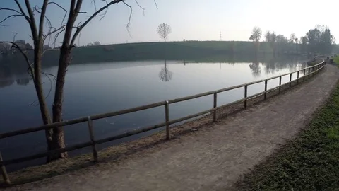 Pan (right to left) around the lake promenade, Italy Stock-Footage 71464088