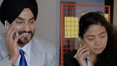 Pan right to left  closeups face portrait of team in formals busy all busy talki Stock Footage 102155911