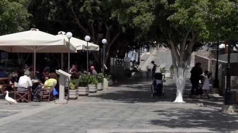 Pan right to left, lakeside cafe Stock Footage 85304320