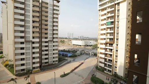 Pan-right-to-left-modern-high-rise-residential-buildings Stock Footage 105585993