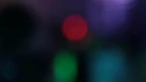 Pan right to left out of focus club dancing 動画素材 102773142