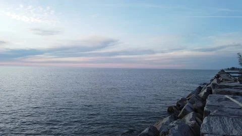 Pan from the right to the left over Lake Erie at dusk Stock Footage 132148947