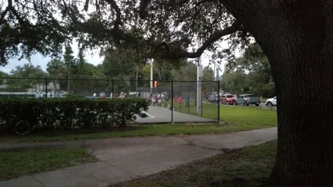Pan right to left Pickle Ball Courts at Crescent Lake Park  St. Petersburg  FL. Stock Footage 257032366