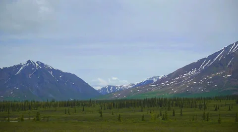 Pan Right, Mountain Range with Green Field 3 Stock Footage 37398619