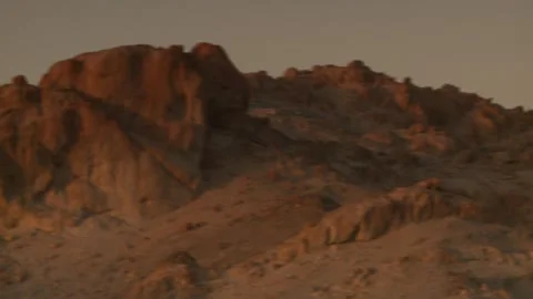 Pan right of mountainous terrain Stock Footage 312400413