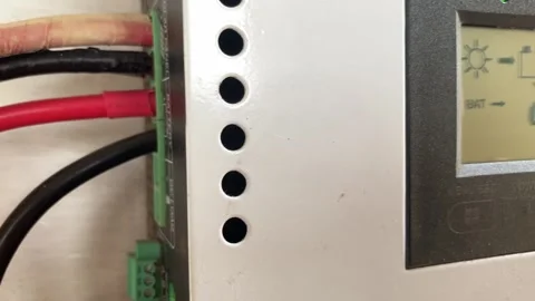 Pan Right From Solar Cables To Digital Display LCD Screen On MPPT Charge Stock Footage 337403129