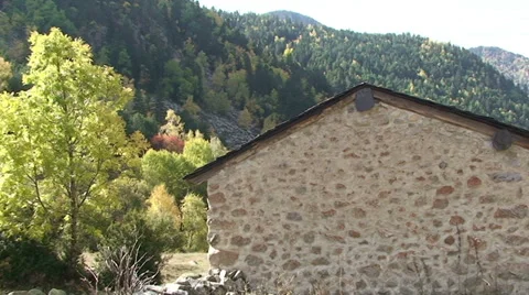 Pan right on stone made house rear part Stock Footage 33420700