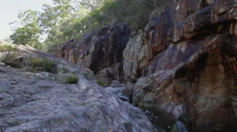 Pan right &amp; tilt of powerful waterfall Nethercote Falls, NSW, Australia Stock Footage 11235369