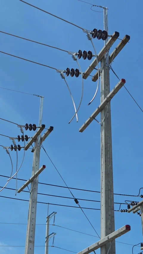 Pan right video of bare aluminum cables preparing for connection . Видео 340376885