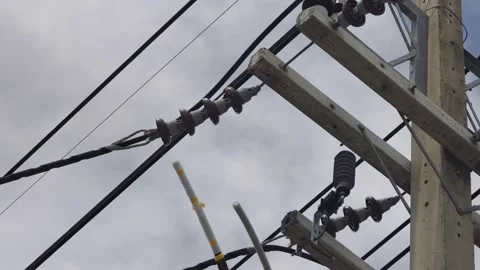 Pan right video of fully spaced cable termination process on a high voltage. 库存影片 340278129