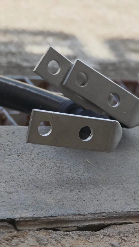 Pan right video of heavy duty 90 degree cable terminal lugs preparing. Видео 340376941