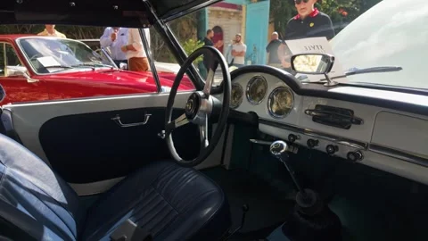 Pan-right view of Alfa Romeo Giulia Spider interior at Style and Elegance event Stock Footage 323823053