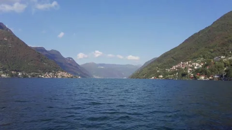 Pan right view from ferryboat, from Laglio town to another side of Lake Como, Stock Footage 255885837