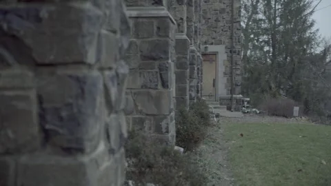 Pan Right from wall to door side of church Maplewood New Jersey 4k Video stock 267737642