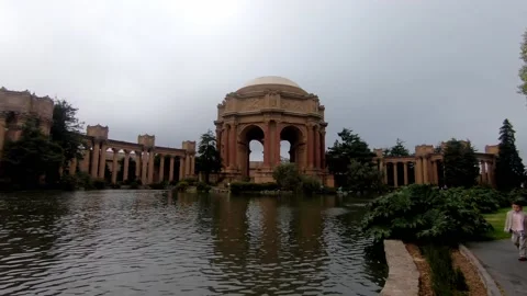 Pan to right of water basin at Palace of Fine Arts in San Francisco Stock Footage 143429994