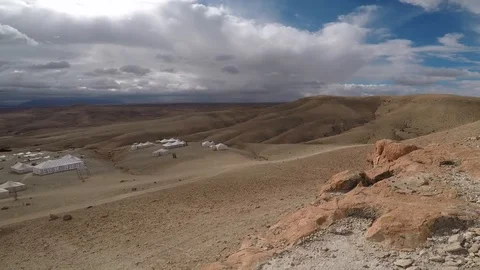 Pan right wide angle bedouin camp Stock Footage 127840888