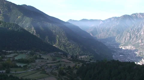 Pan to right on wide view of Andorra la Vella and its valley Stock Footage 33405910