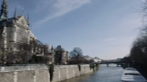 Pan from the river to Notre Dame Stock Footage 49360726