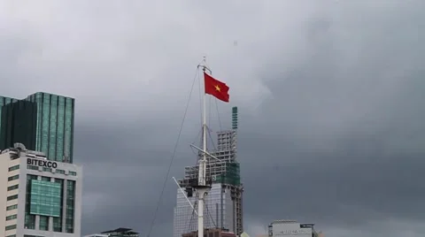 Pan of River in Saigon, Starting With Waving Vietnam Flag 스톡 동영상 44420664