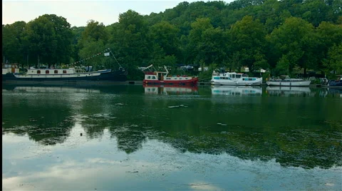 Pan of a river scene in the evening Stock Footage 40428408
