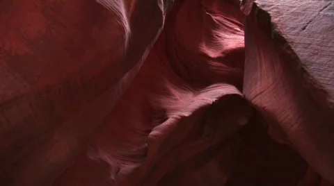 Pan-up of a rock-climber making her way up a granite cliff face Video stock 440733