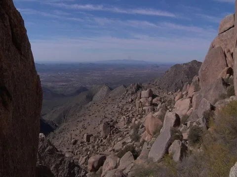 Pan Up to Rock Structure in Desert Stock Footage 50438891