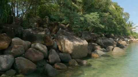 Pan Rocks To Lagoon Vídeo Stock 144589353