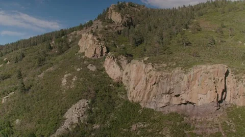 Pan up Rocky Mountain Face Stock Footage 204869168