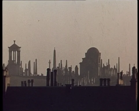 Pan of rooftops and chimneys of Glasgow in sunset, UK 1965 Stock-Footage 142221177