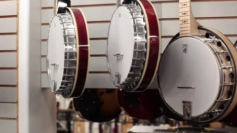 Pan row of banjos Stock Footage 69111219