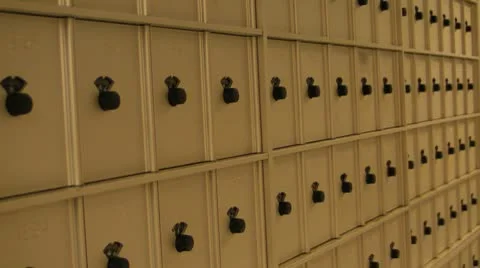 Pan of a row of mail boxes Stock Footage 8849751
