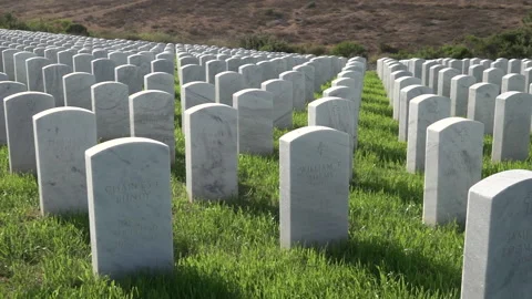 Pan of rows of white grave markers in Miramar National Cemetery Stock Footage 154603887