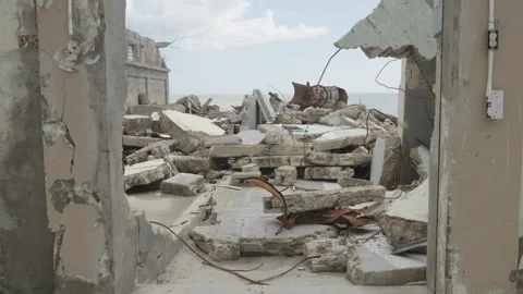 Pan up to rubble in aftermath of Hurricane Melissa Stock Footage 340820733