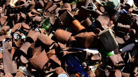 Pan of Rusting Tin Cans in a Mojave Desert Stock Footage 32406074